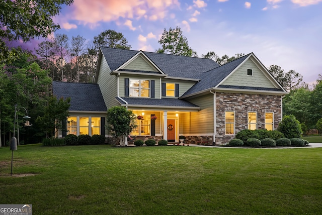 372 Abbington Way, Clarkesville, GA 30523 - view of front of property featuring a front yard, roof with shingles, stone siding, and a porch