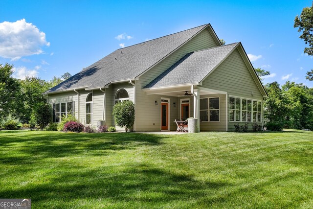 372 Abbington Way, Clarkesville, GA 30523 - rear view of house featuring ceiling fan, a shingled roof, a lawn, and a patio area