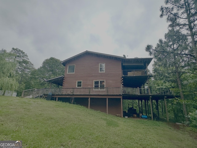 697 Waddell Rd, Woodbury, GA 30293 - back of property with a yard and a wooden deck