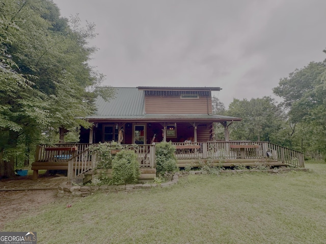697 Waddell Rd, Woodbury, GA 30293 - back of property featuring a yard
