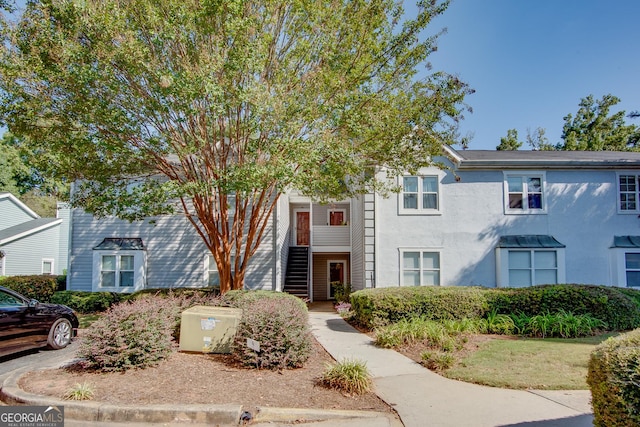 72 Sutton Pl, Avondale Estates, GA 30002 - view of front of home featuring stucco siding
