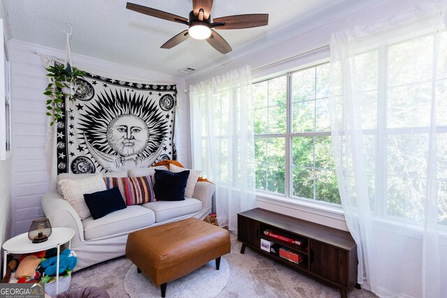 72 Sutton Pl, Avondale Estates, GA 30002 - sitting room featuring a ceiling fan, healthy amount of natural light, carpet, and ornamental molding