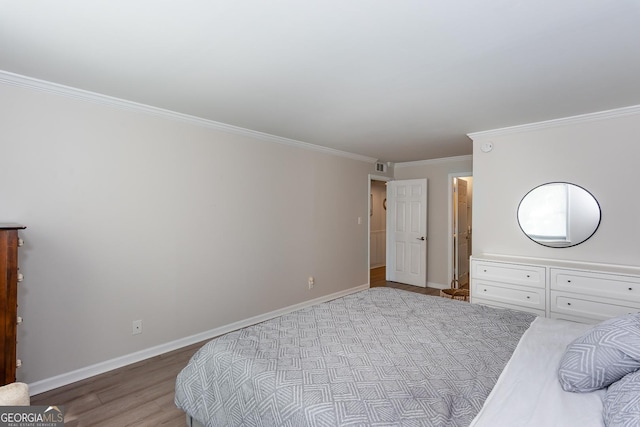 72 Sutton Pl, Avondale Estates, GA 30002 - bedroom featuring crown molding, baseboards, and wood finished floors