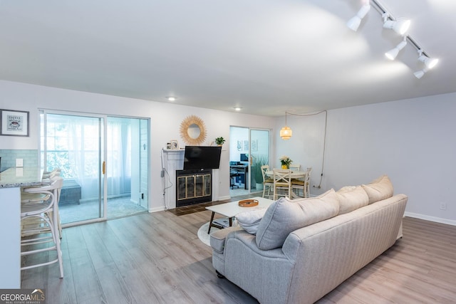 72 Sutton Pl, Avondale Estates, GA 30002 - living area with track lighting, wood finished floors, baseboards, and recessed lighting