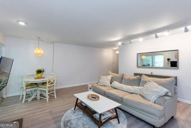 72 Sutton Pl, Avondale Estates, GA 30002 - living area with wood finished floors, track lighting, and baseboards