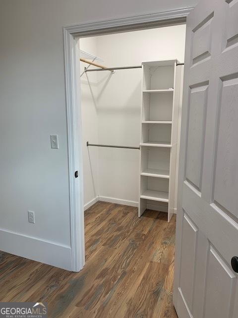 3827 Avant Rd, Blackshear, GA 31516 - spacious closet featuring dark wood finished floors