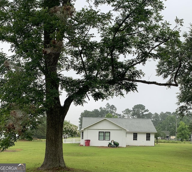 3827 Avant Rd, Blackshear, GA 31516 - view of side of property featuring a lawn and metal roof