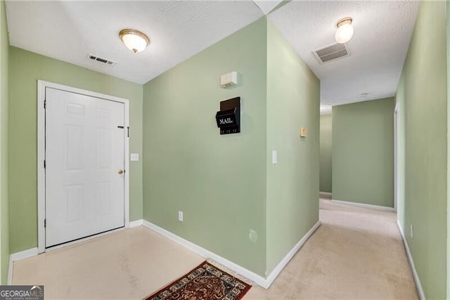 424 Yellow River Walk, Lawrenceville, GA 30043 - carpeted foyer featuring baseboards