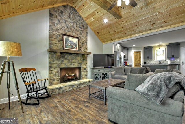 1214 Zenith Trl, Ellijay, GA 30540 - living room featuring wooden ceiling, dark wood-type flooring, ceiling fan, high vaulted ceiling, and a fireplace