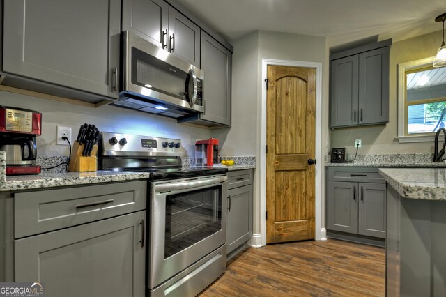 1214 Zenith Trl, Ellijay, GA 30540 - kitchen with stainless steel appliances, gray cabinets, dark wood finished floors, and light stone counters