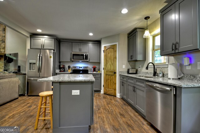 1214 Zenith Trl, Ellijay, GA 30540 - kitchen with stainless steel appliances, gray cabinetry, light stone countertops, recessed lighting, and a kitchen island