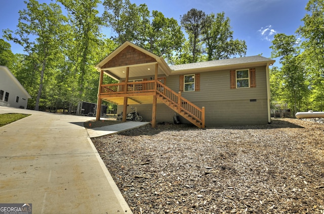 1214 Zenith Trl, Ellijay, GA 30540 - chalet / cabin featuring concrete driveway, stairs, a wooden deck, crawl space, and roof with shingles