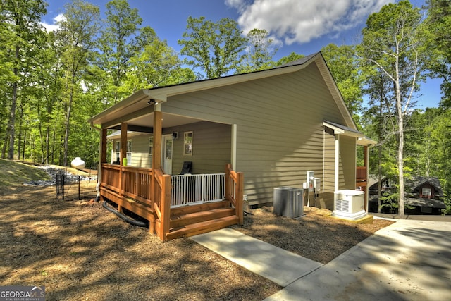 1214 Zenith Trl, Ellijay, GA 30540 - view of property exterior featuring cooling unit, a porch, and crawl space