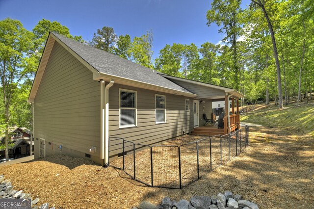 1214 Zenith Trl, Ellijay, GA 30540 - view of side of home featuring a deck, crawl space, and a shingled roof