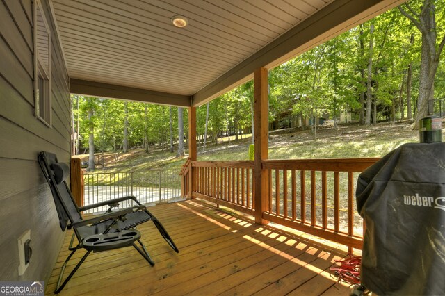 1214 Zenith Trl, Ellijay, GA 30540 - wooden terrace featuring view of wooded area