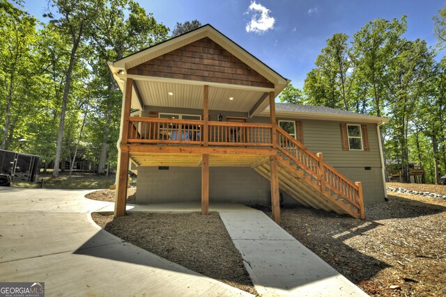 1214 Zenith Trl, Ellijay, GA 30540 - rustic home featuring crawl space, stairs, a wooden deck, and a shingled roof