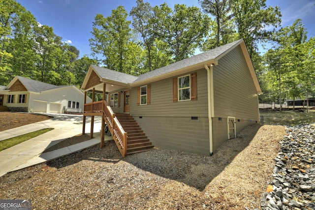 1214 Zenith Trl, Ellijay, GA 30540 - view of front of house with crawl space, stairs, a garage, and a shingled roof