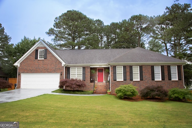 2884 Overwood Ln, Snellville, GA 30078 - view of front of house featuring concrete driveway, brick siding, a garage, a front yard, and roof with shingles