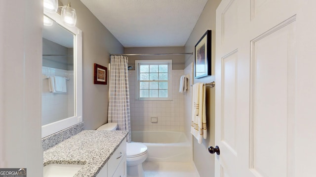 2884 Overwood Ln, Snellville, GA 30078 - bathroom featuring vanity, shower / tub combo with curtain, and a textured ceiling