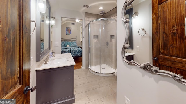 2884 Overwood Ln, Snellville, GA 30078 - ensuite bathroom with a stall shower, vanity, and tile patterned flooring
