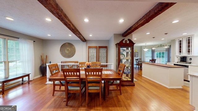 2884 Overwood Ln, Snellville, GA 30078 - dining area featuring beamed ceiling, light wood finished floors, and recessed lighting