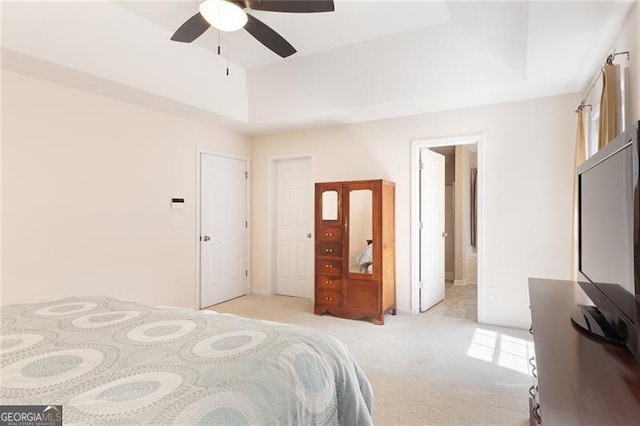 2577 Abbotts Glen Dr NW, Acworth, GA 30101 - bedroom featuring light colored carpet, a tray ceiling, ceiling fan, and ensuite bath