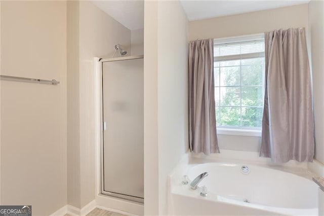 2577 Abbotts Glen Dr NW, Acworth, GA 30101 - full bathroom with a shower stall and a garden tub