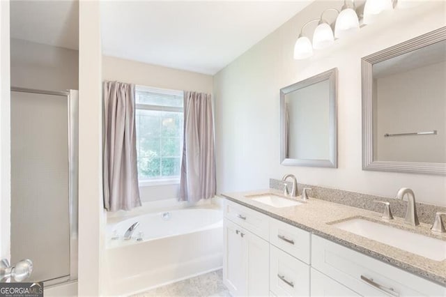 2577 Abbotts Glen Dr NW, Acworth, GA 30101 - bathroom with a garden tub, double vanity, and a shower stall