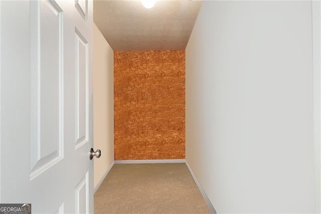 2577 Abbotts Glen Dr NW, Acworth, GA 30101 - corridor featuring light carpet and a textured ceiling