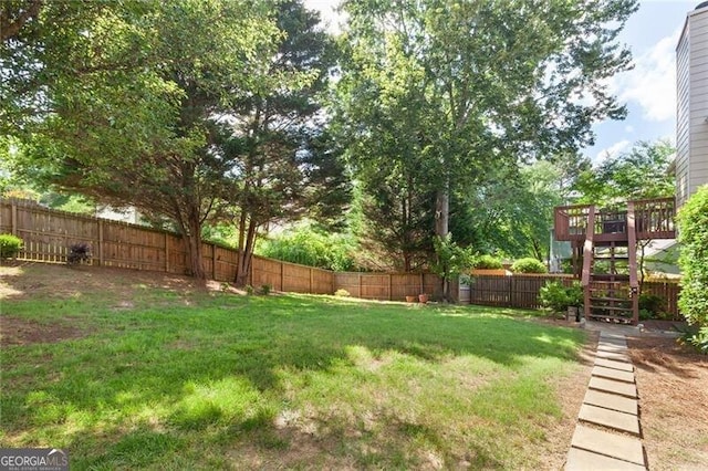 2577 Abbotts Glen Dr NW, Acworth, GA 30101 - fenced backyard with stairway and a wooden deck