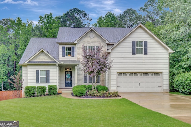 108 Hidden Springs Dr, Lagrange, GA 30240 - view of front facade featuring a garage, concrete driveway, and a shingled roof