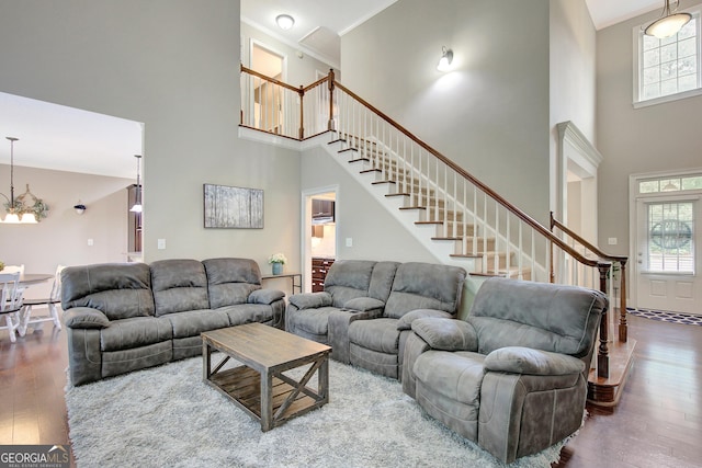 108 Hidden Springs Dr, Lagrange, GA 30240 - living room with a towering ceiling, stairs, healthy amount of natural light, hardwood / wood-style flooring, and a chandelier