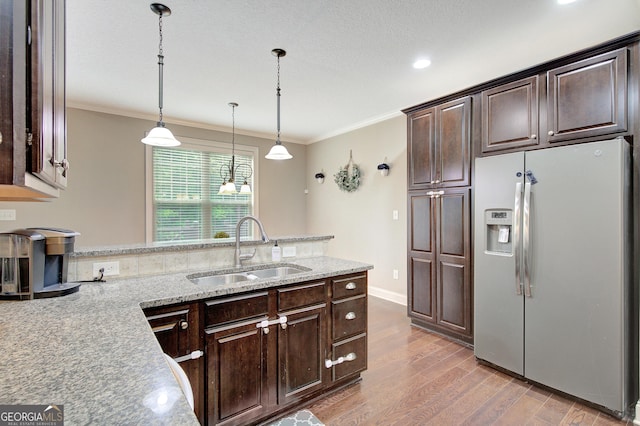 108 Hidden Springs Dr, Lagrange, GA 30240 - kitchen featuring fridge with ice dispenser, crown molding, dark brown cabinets, wood finished floors, and a peninsula