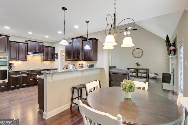 108 Hidden Springs Dr, Lagrange, GA 30240 - dining room featuring a ceiling fan, dark wood-style floors, recessed lighting, and vaulted ceiling