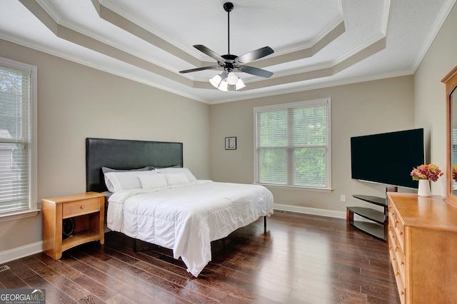 108 Hidden Springs Dr, Lagrange, GA 30240 - bedroom featuring a tray ceiling, multiple windows, ornamental molding, dark wood finished floors, and ceiling fan