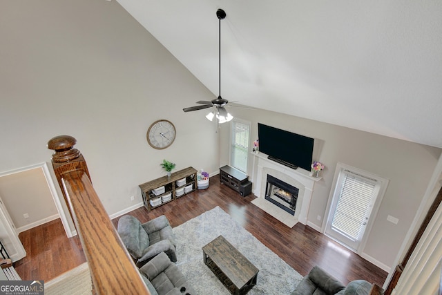108 Hidden Springs Dr, Lagrange, GA 30240 - living area featuring lofted ceiling, a fireplace with flush hearth, wood finished floors, and a ceiling fan