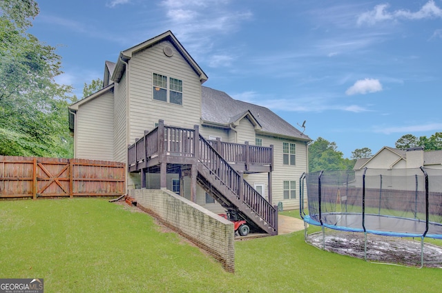 108 Hidden Springs Dr, Lagrange, GA 30240 - back of house featuring a trampoline, a deck, and stairway