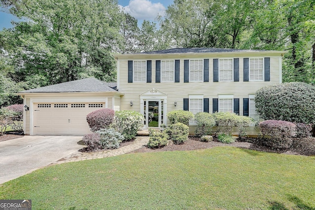 5548 Fitzpatrick Trce, Peachtree Corners, GA 30092 - colonial house with a garage, a front lawn, and driveway