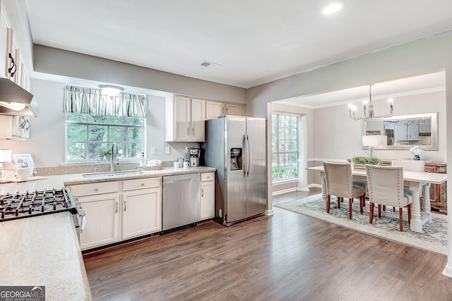 5548 Fitzpatrick Trce, Peachtree Corners, GA 30092 - kitchen with appliances with stainless steel finishes, a sink, wall chimney exhaust hood, a chandelier, and light countertops