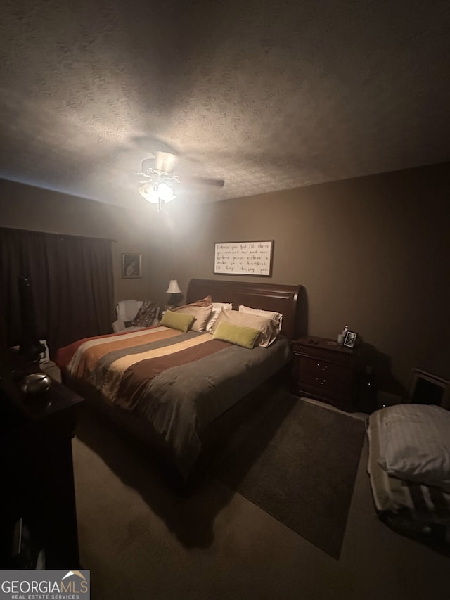 65 Barclay Ct, Newnan, GA 30263 - bedroom featuring a textured ceiling, carpet, and a ceiling fan