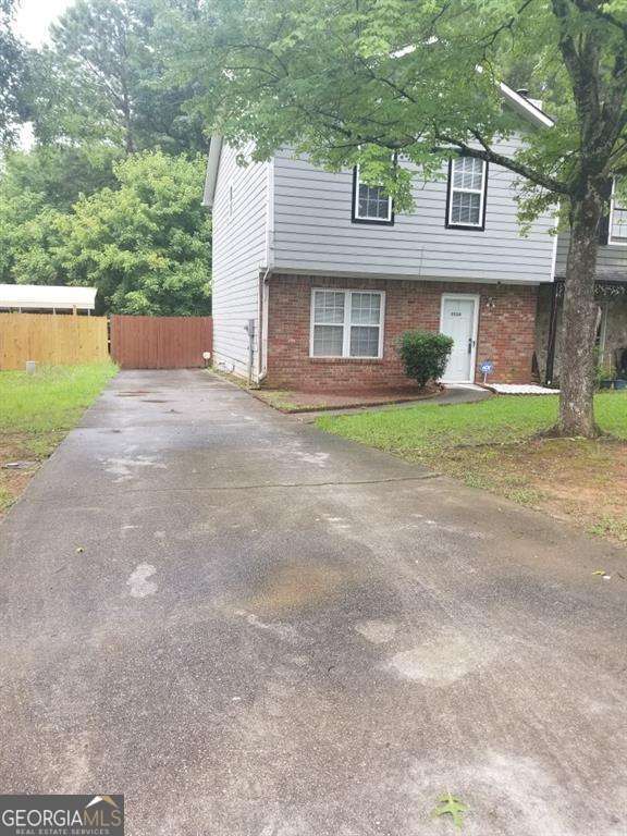 3530 Hopkins Ct, Powder Springs, GA 30127 - view of front of property featuring driveway and brick siding