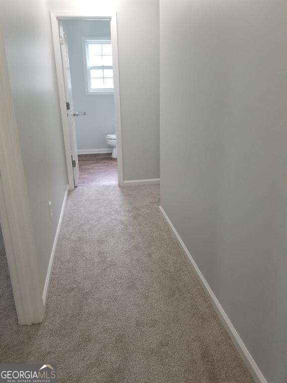 3530 Hopkins Ct, Powder Springs, GA 30127 - corridor with carpet and baseboards