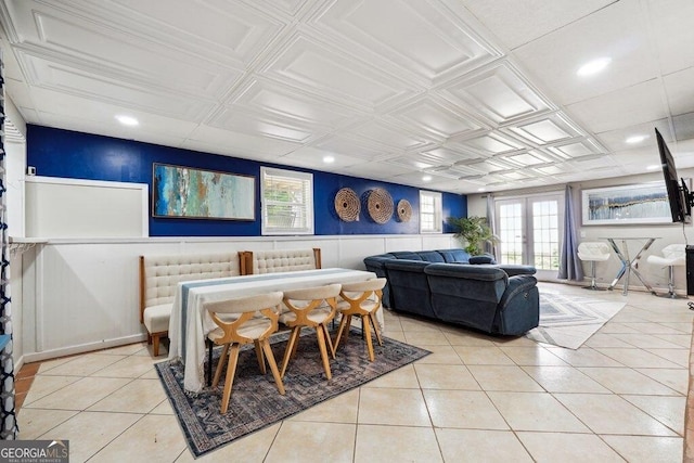 4630 Smokestone Dr, Douglasville, GA 30135 - living room featuring light tile patterned flooring, french doors, an ornate ceiling, wainscoting, and recessed lighting