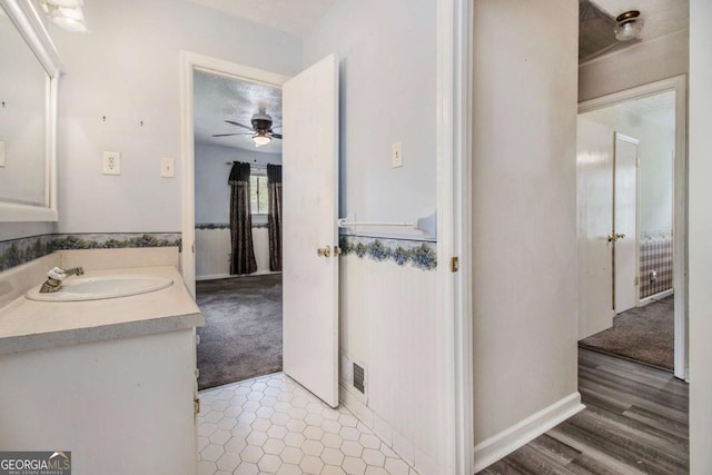 2209 Willoby Ct, Morrow, GA 30260 - bathroom featuring ceiling fan and vanity