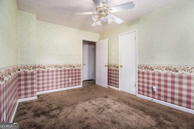 2209 Willoby Ct, Morrow, GA 30260 - empty room with carpet flooring, a ceiling fan, and wallpapered walls