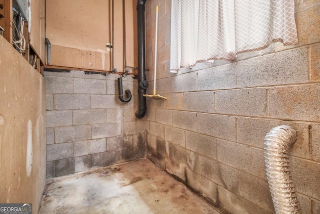 2209 Willoby Ct, Morrow, GA 30260 - detailed view of concrete floors and concrete block wall