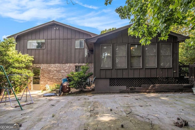 2209 Willoby Ct, Morrow, GA 30260 - back of property featuring a patio and brick siding