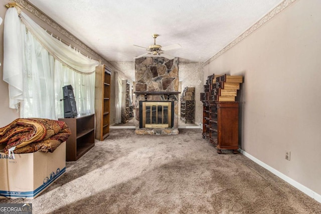 2209 Willoby Ct, Morrow, GA 30260 - carpeted living area featuring a ceiling fan, a fireplace, and baseboards