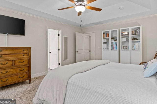 632 Holly Springs Ct, Athens, GA 30606 - carpeted bedroom with a tray ceiling, a ceiling fan, and ornamental molding