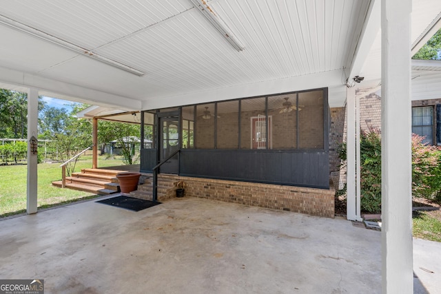 1206 Zittrouer Rd, Guyton, GA 31312 - view of patio / terrace with a sunroom